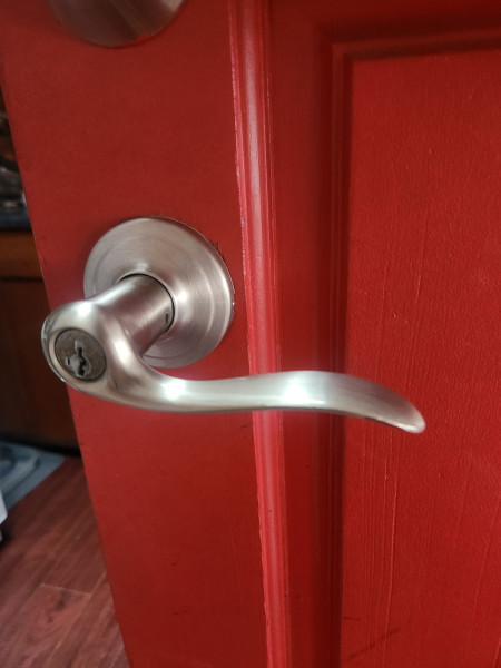 Tighten the set-screw on my door handle